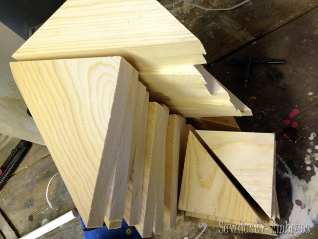 Pile of triangles that will be used for the top surface of an end table! {Sawdust and Embryos}