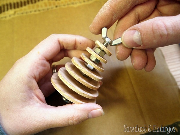 Make your own Industrial Christmas Tree Ornament using basic hardware and discs of wood {Sawdust and Embryos}