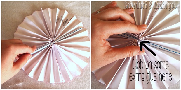 Take a straw or popsicle stick and glue it down the center of your flattened pinwheel to give it some stability