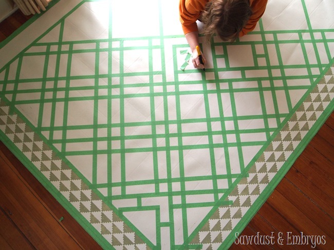 Buy a remnant of linoleum to use as a dining room area rug... and paint it in any pattern! 