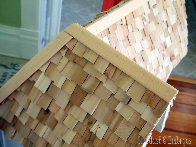 Wood-shim roofing shingles on dollhouse {Sawdust and Embryos}