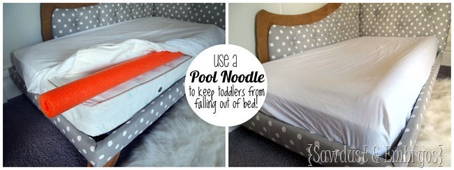 Use a pool noodle under the mattress pad to create a 'lip' and keep your toddler from rolling out! 