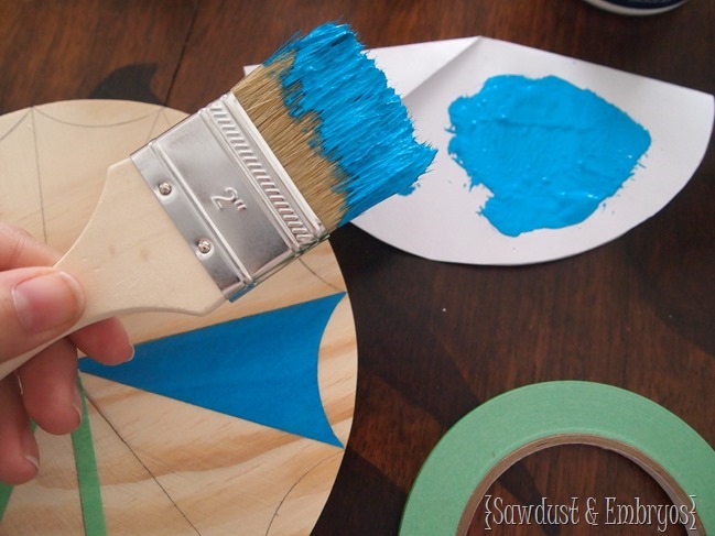 Make your own paint brush starburst clock or mirror! {Sawdust & Embryos}