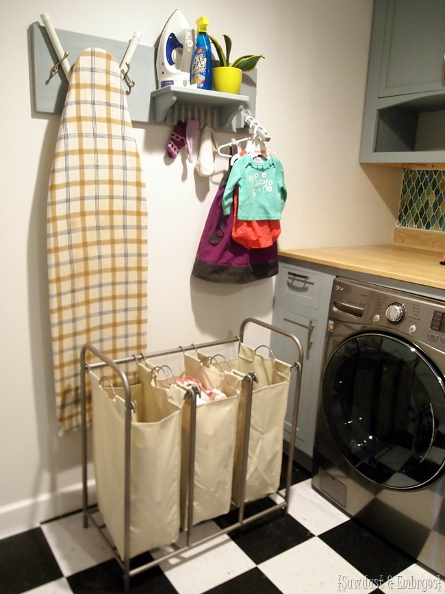 DIY Organization for the Laundry Room... holds iron, ironing board, unmatched socks, and hangers! {Sawdust and Embryos}