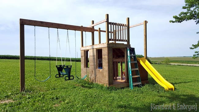 Building a playhouse with slide, swings, and fort on top! {Sawdust and Embryos}