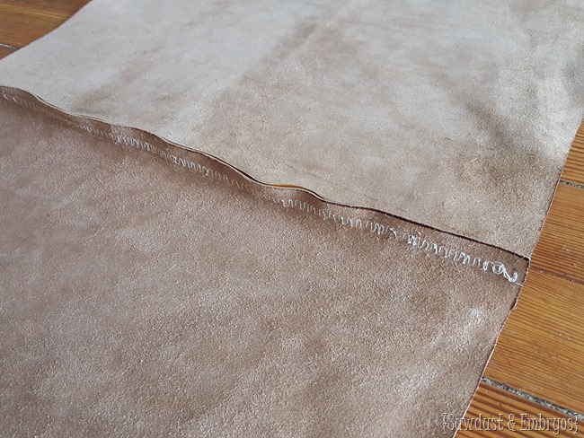 Sewing a leather seam for upholstering a tufted ottoman 