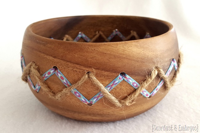 Altering a simple wooden bowl by drilling holes and weaving in ribbon and twine! {Sawdust & Embryos}