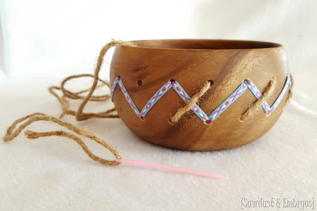 Altering a simple wooden bowl by drilling holes and weaving in ribbon and twine! {Sawdust and Embryos}