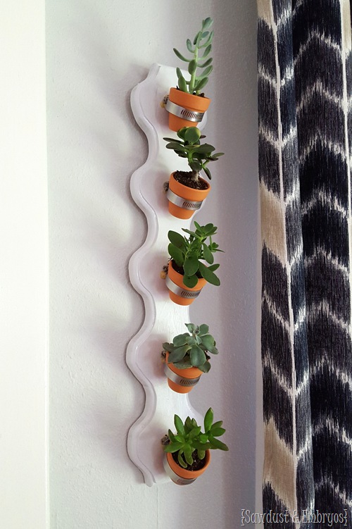 Simple vertical succulent planter using hose clamps and tiny terra cotta pots! {Sawdust and Embryos}